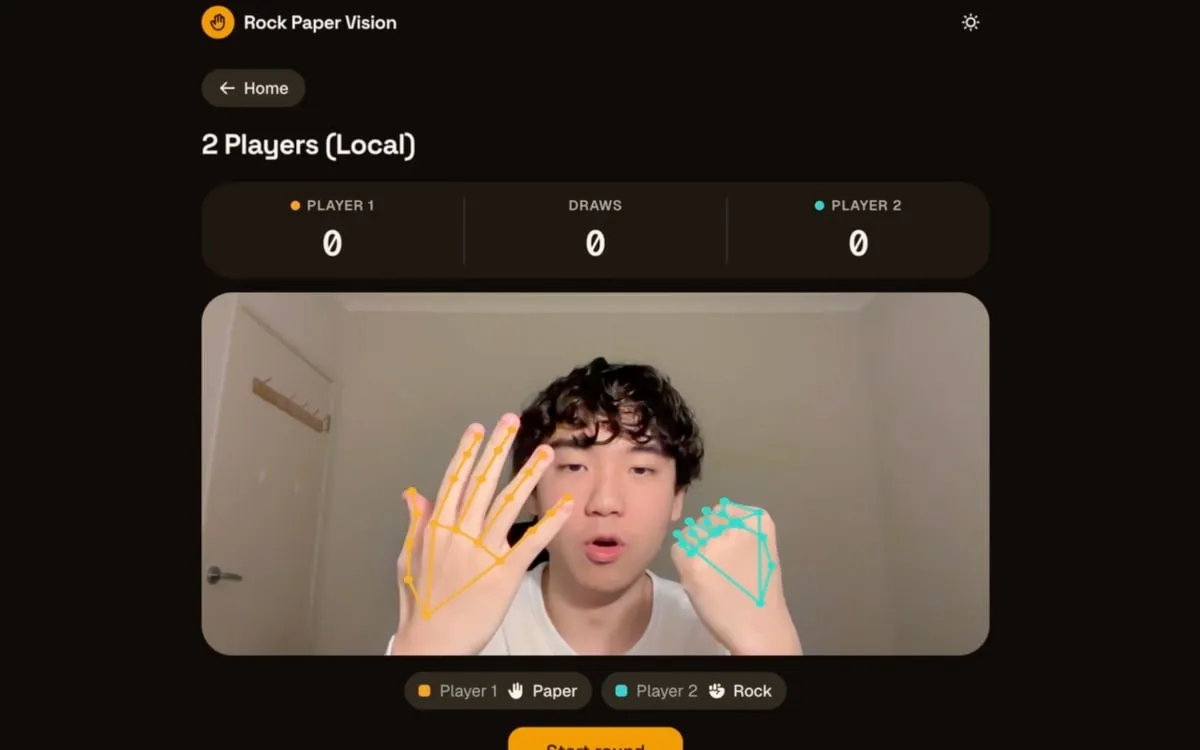 Screenshot of the Rock Paper Vision two-player game with hand-tracking overlays
